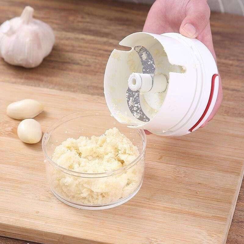 Handheld Garlic Crusher, Kitchen Garlic Mincer, Plastic Garlic Press - available at Sparq Mart