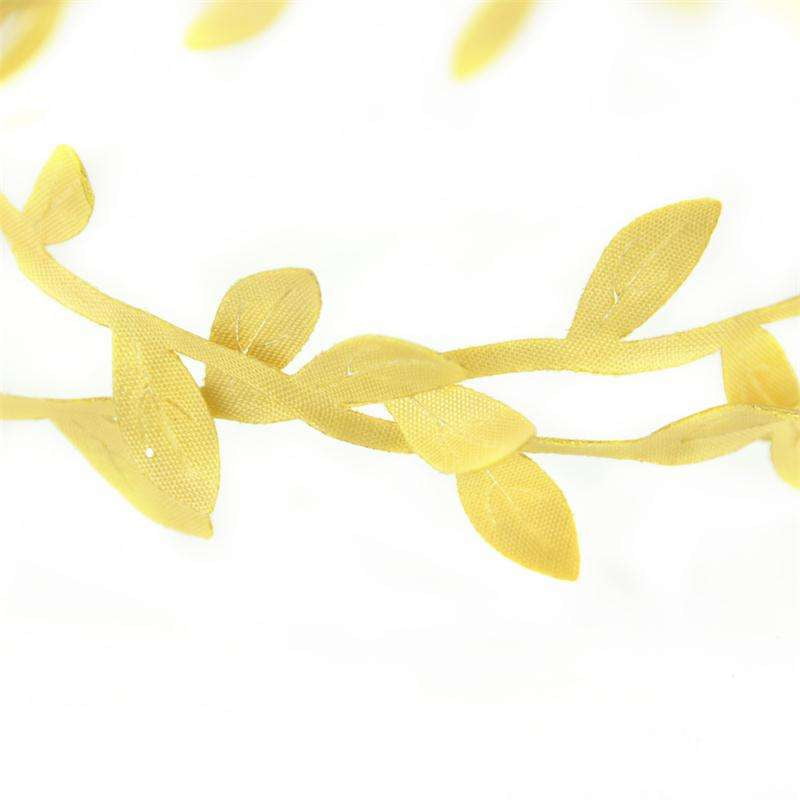 metallic leaf embellishment, rattan leaf decor, silk leaf garland - available at Sparq Mart