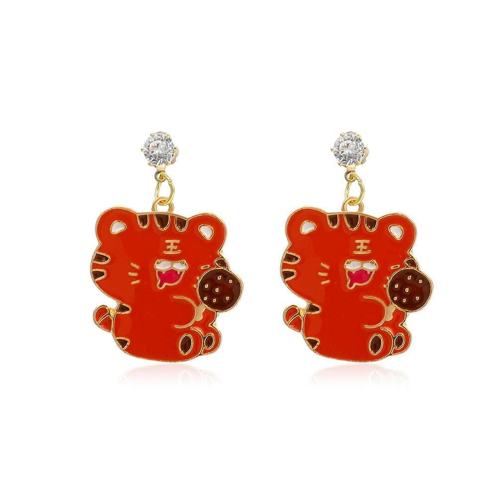 sparkling diamond jewelry, unique style earrings, zodiac tiger earrings - available at Sparq Mart