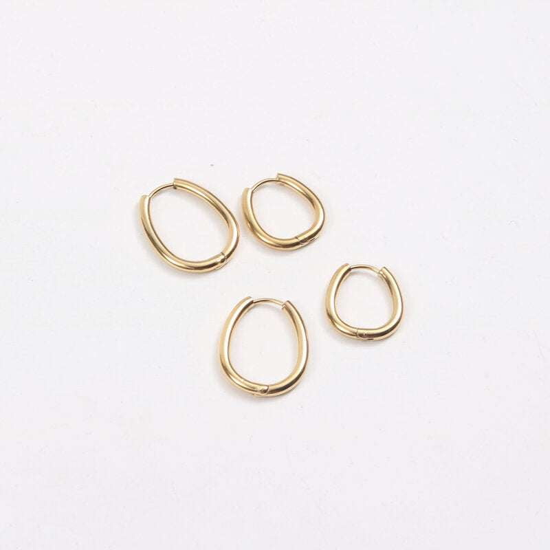 elegant jewelry essentials, titanium steel studs, trendy gold earrings - available at Sparq Mart