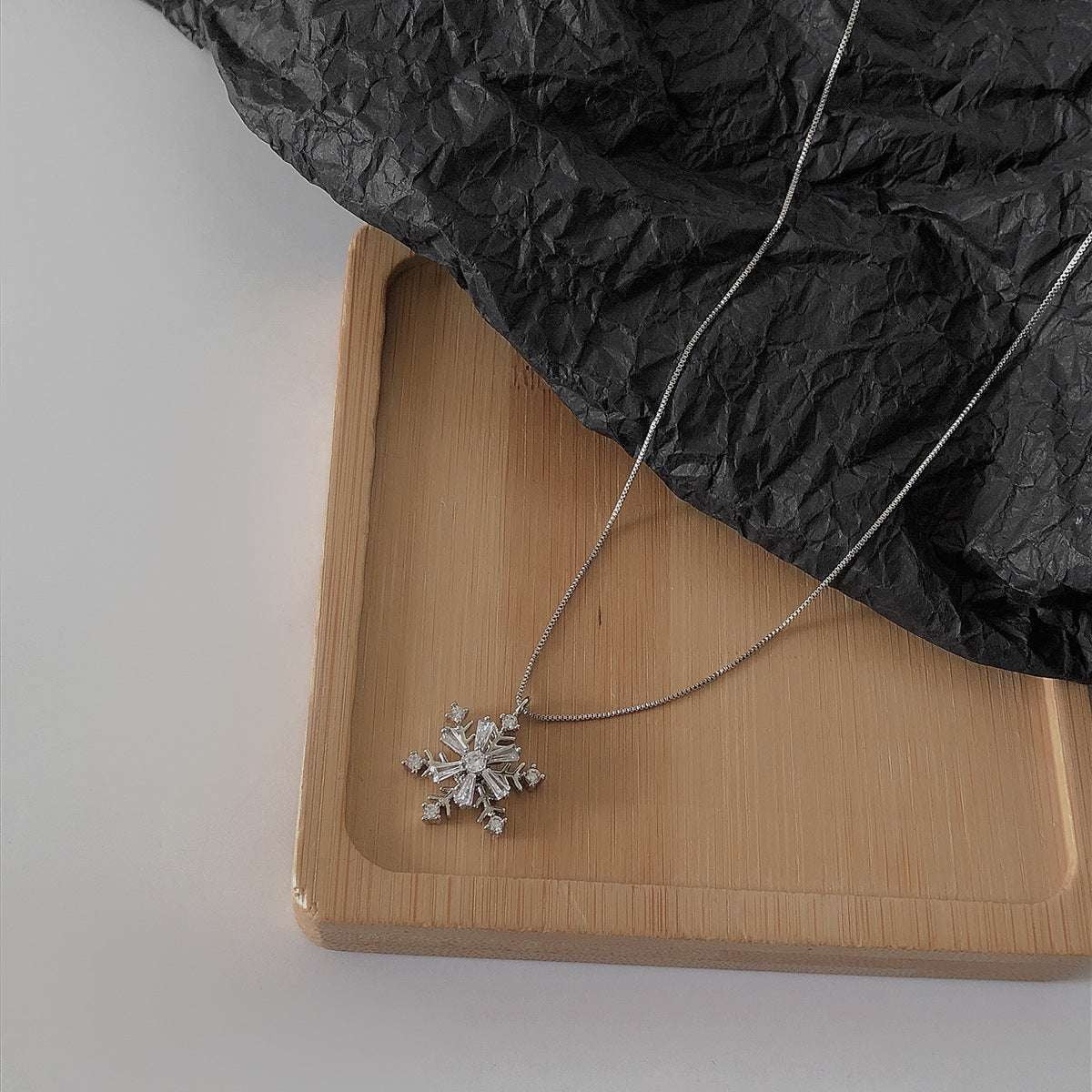 elegant silver necklace, rotating snowflake pendant, snowflake diamond necklace - available at Sparq Mart